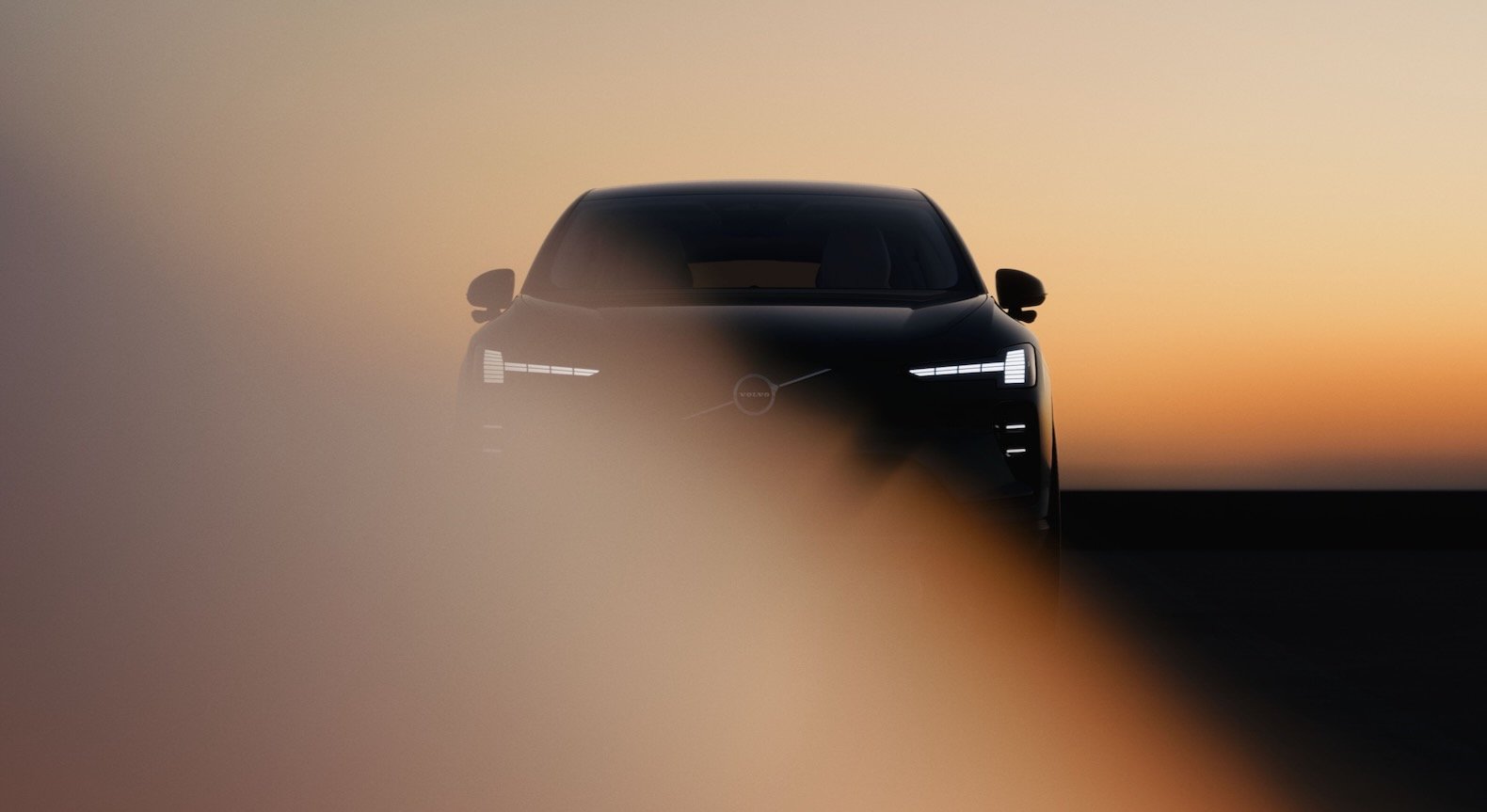 Volvo EX60 Teased with 400 Miles of Range and 10-Minute Fast Charging